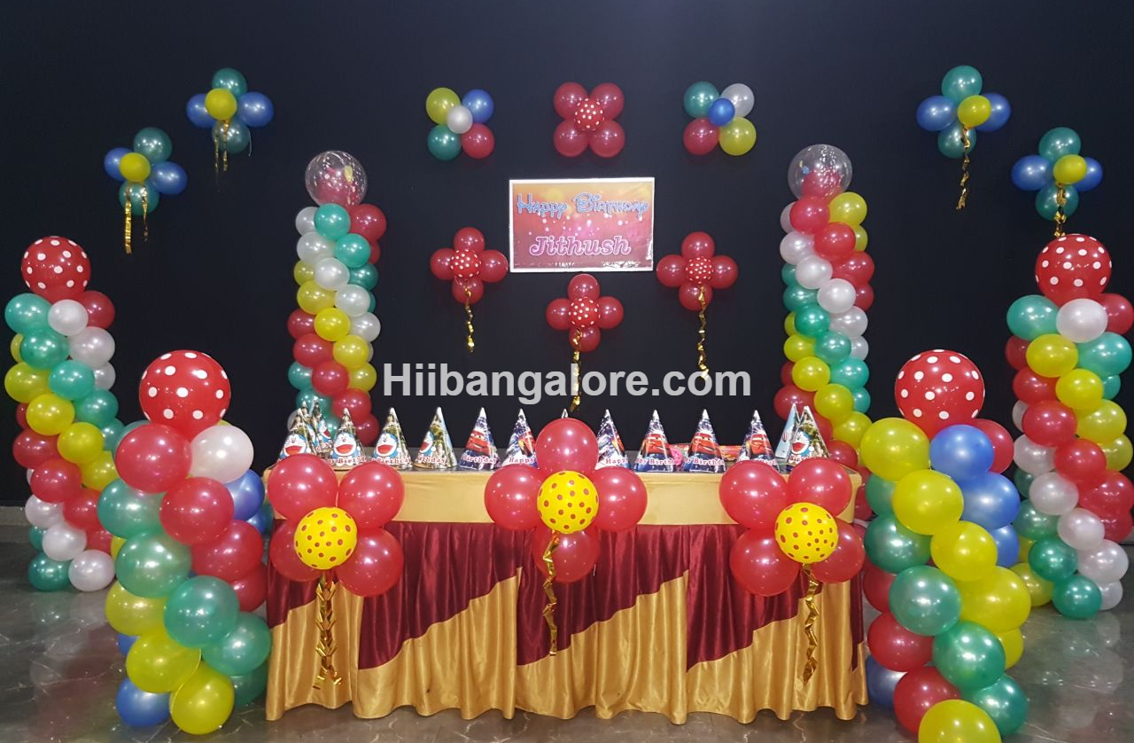 Rainbow color birthday party balloon decorators Bangalore
