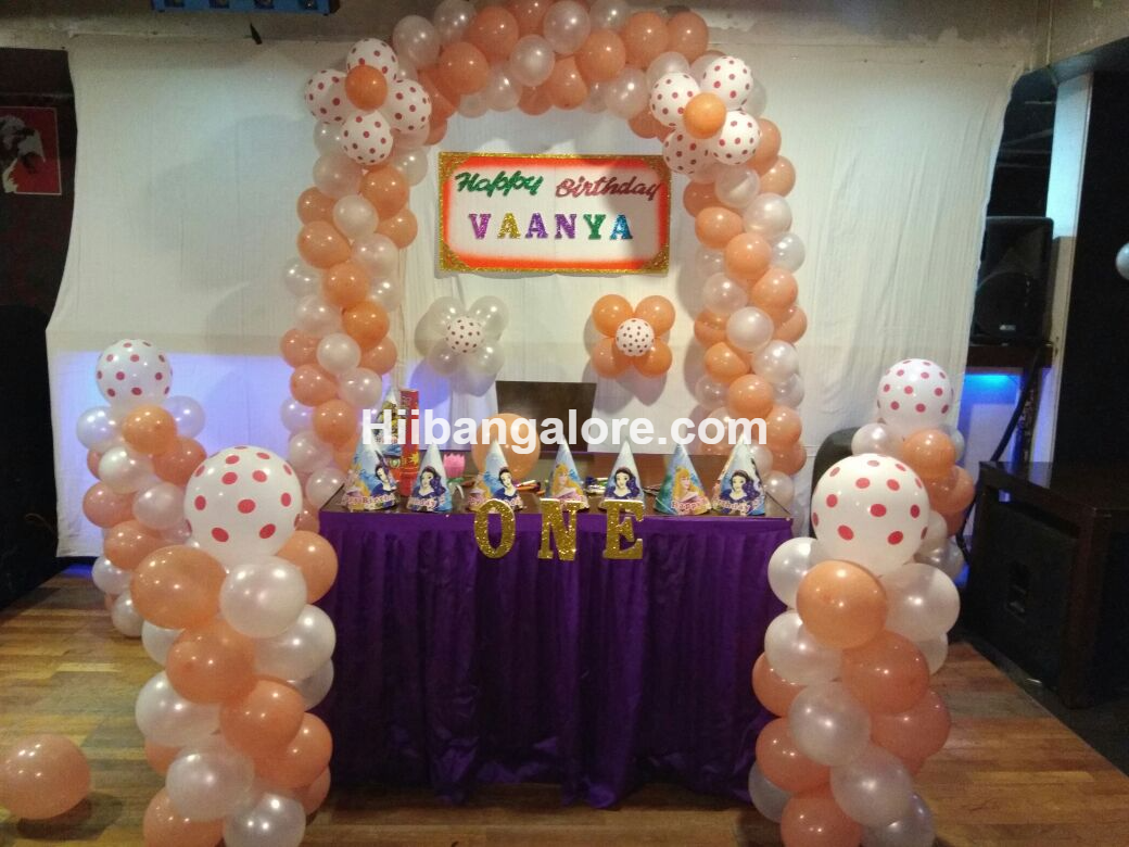 Peach and white color balloon decorators Bangalore