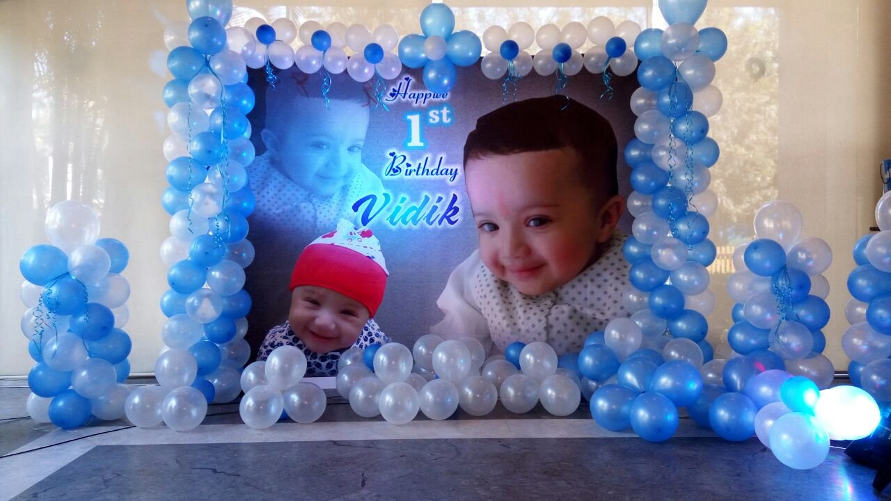 Baby photo banner Birthday party balloon decorators Bangalore