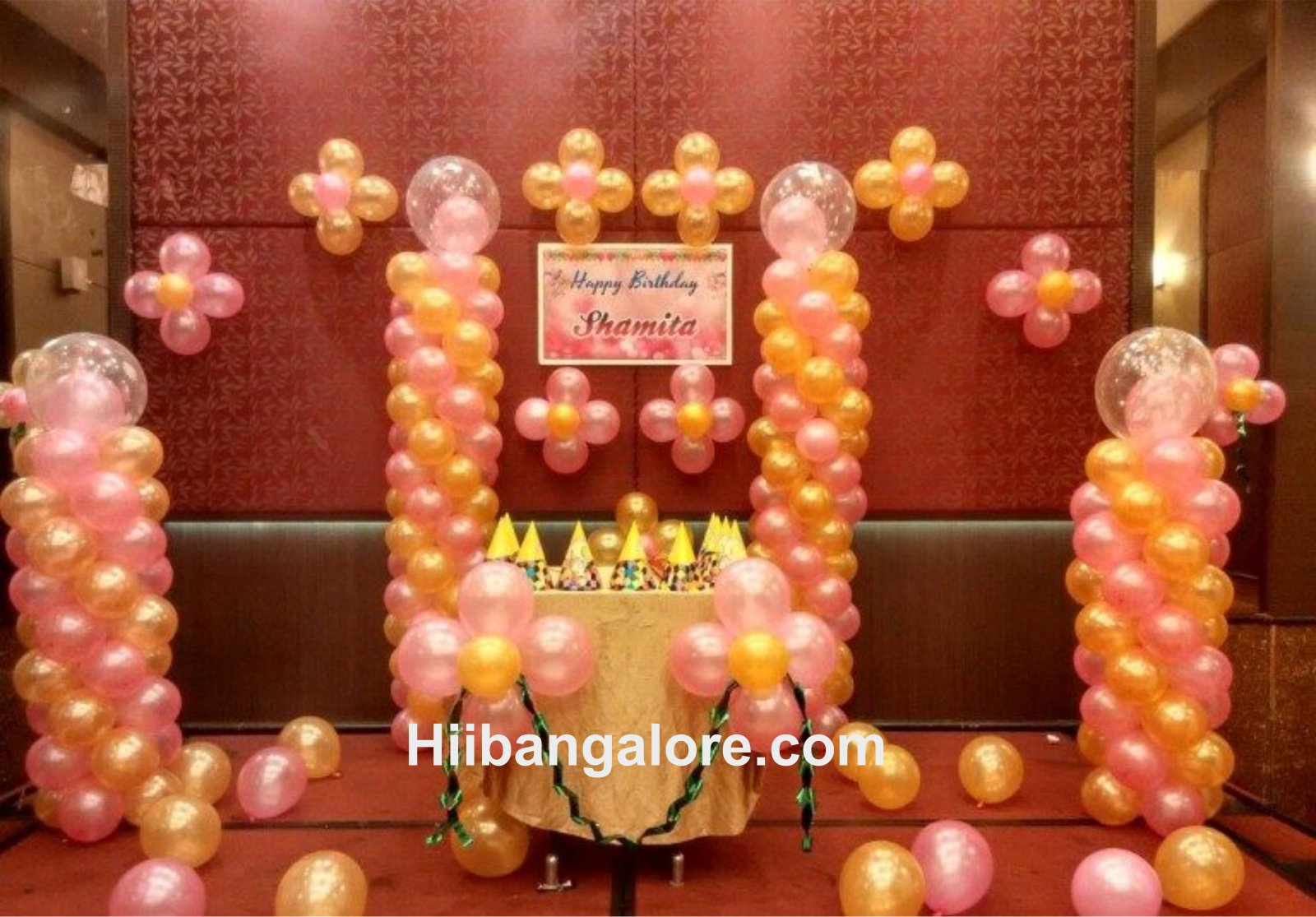Pink and gold birthday party balloon decorators Bangalore