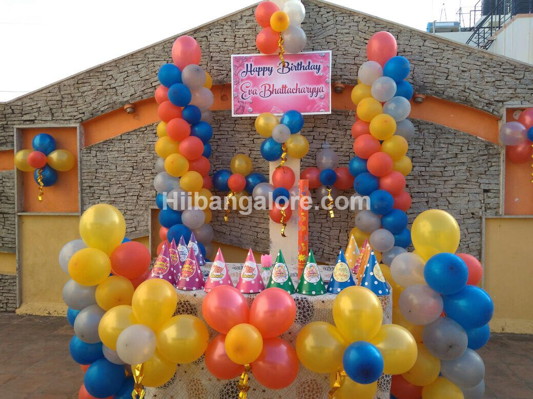 Multi color birthday party balloon decorators Bangalore