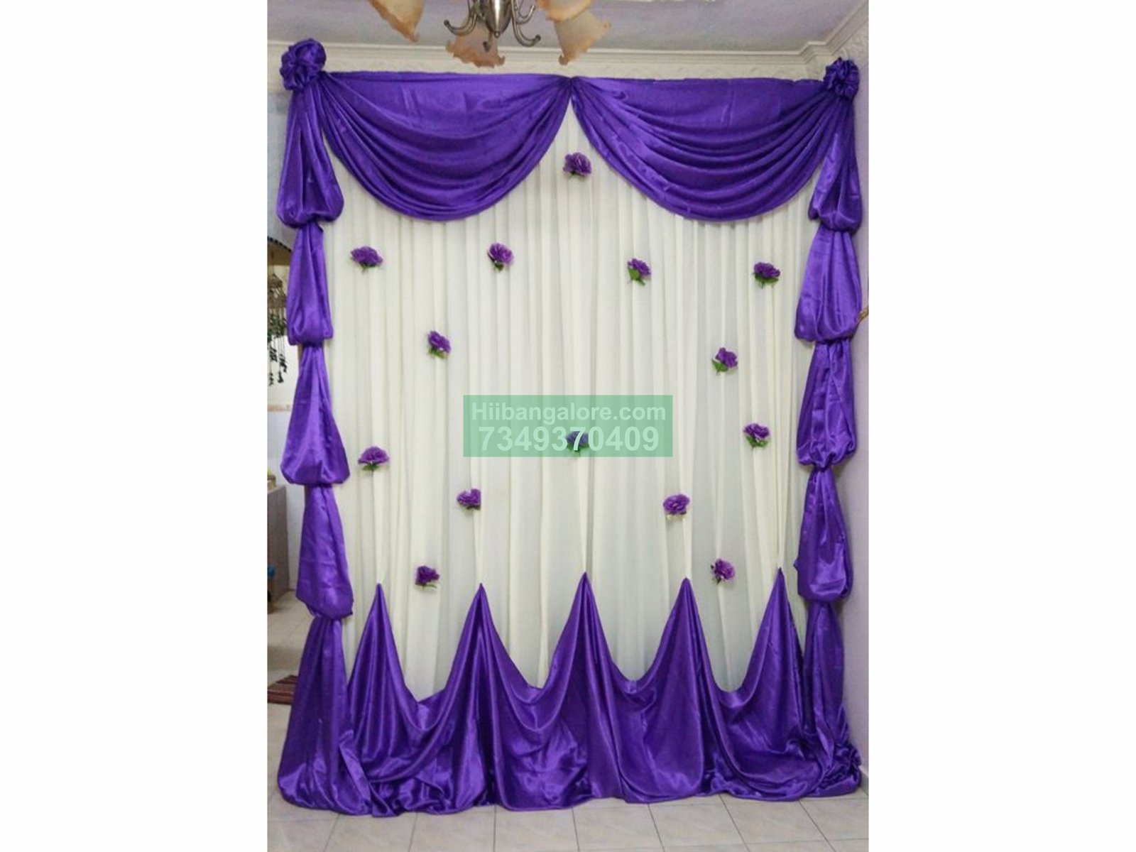 simple purple backdrop decoration for engagement at home Bangalore