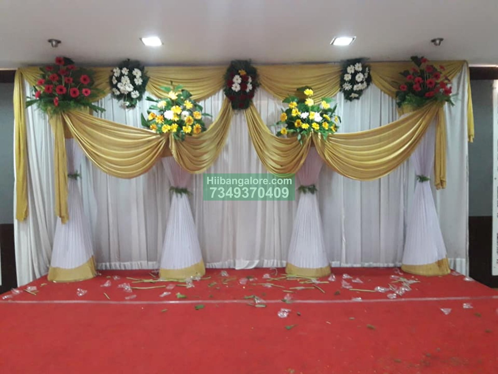white backdrop engagement flower decoration Bangalore