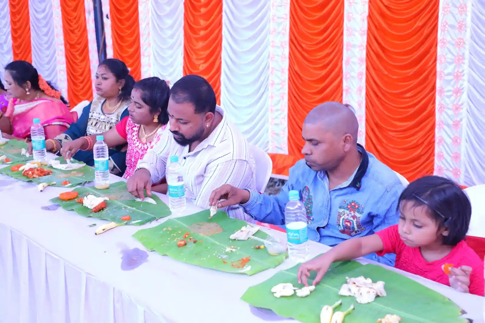 People being served traditional Andhra meal during a special function