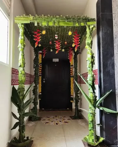 Pandiri flower decoration with banana leaves for apartment housewarming in Bangalore.