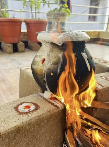 Auspicious gruhapravesha milk boiling ritual performed at home in Bangalore