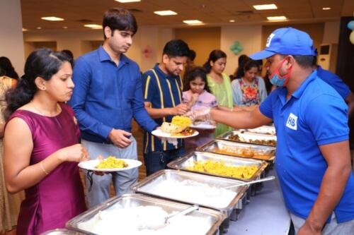 Hiibangalore caterer serving food to the guests